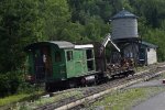 MWCR M1 comes off the mountain with a maintenance of way work train in advance of the first passenger train departure for the summit